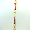 18KT Yellow Gold Diamond and Rubies XO Design