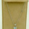 2.50 Ct Aquamarine with 0.26 Ct Diamonds Classy Retro Necklace 18k hanging on a piece carton
