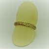 1.50 Ct Sapphire Cluster Eternity Band 18k Stackable Ring on a carton finger