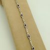 3.50 Ct Unheated Sapphire and 0.72 Ct Diamond Cocktail Tennis Bracelet 14k on a piece of carton