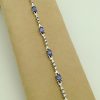 3.50 Ct Unheated Sapphire and 0.72 Ct Diamond Cocktail Tennis Bracelet 14k on a piece of carton