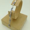 8.25 Ct Tanzanite and 0.16 Ct Diamond Swirl Bracelet 14k