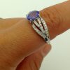 0.25 Ct Tanzanite and 0.44 Ct Diamond Contemporary Ring 14k on a finger