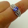 0.25 Ct Tanzanite and 0.44 Ct Diamond Contemporary Ring 14k on a finger
