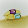 1.00 Ct Amethyst and 1.0 Ct Blue Topaz Retro Statement Ring 14k on a piece of carton
