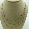 3.78 Ct Garnet, Peridot and Aquamarine Gemstone by the yard 14k Necklace on a carton neck