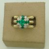 1.07 Ct Colombian Emerald and 0.75 Ct Diamonds Art Deco Twisted Cocktail Ring 18k on a carton box