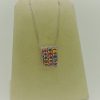 6.00 Ct Sapphire Pendant 0.75 Ct Diamonds 14k on a piece of carton