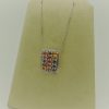 6.00 Ct Sapphire Pendant 0.75 Ct Diamonds 14k on a piece of carton
