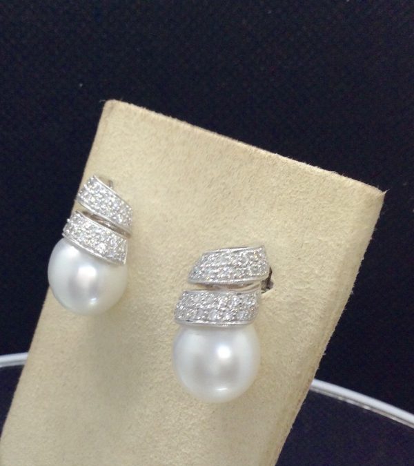 14mm South Sea Pearl 18k White Gold Earring with 1.25 Ct Diamond on a Twirling Design (side view)