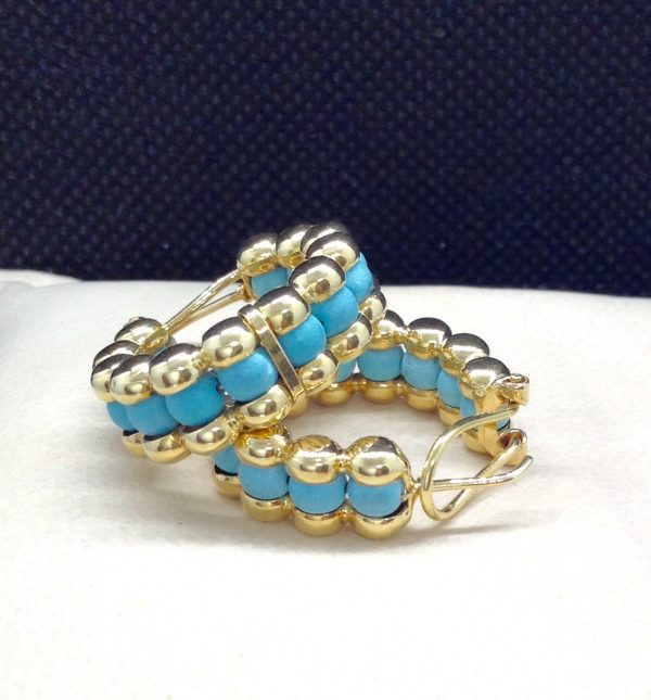 Unique 14k Yellow Gold Hoops with 2.65 Ct Turquosie on a pillows