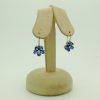 18K White Gold 6 CT Unheated Sapphire Flower Earrings W/ 0.60 CT VS Diamond hanging on fake carton ears