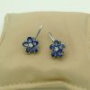 18K White Gold 6 CT Unheated Sapphire Flower Earrings W/ 0.60 CT VS Diamond on a pillow