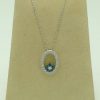 14k white gold diamond and sapphire necklace on a fake carton neck
