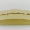 18Kt White Gold With 1.00Ct Tw of Diamond and .75Ct Sapphires Bracelet on a piece of carton