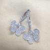 3.00 Ct Diamond Pave Butterfly 18k White Gold Dangle Earrings with Diamond Hoops on a pillow
