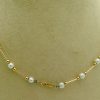 Classy 4mm Akoya Pearls w/ 14k yellow gold beads and bars on a fake neck