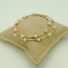 Classy 4mm Akoya Pearls w/ 14k yellow gold beads and bars on a pillow