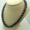 Elegant 12mm Black Tahitian Pearls w/ 14k White Gold Clasp on a fake neck