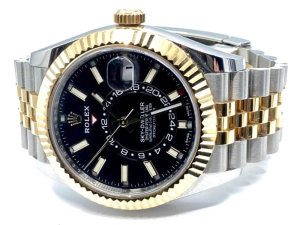 gold two-tone Jubilee sky dweller with fluted bezel and black tile. 42 mm